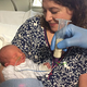 Susie Thoms with her new baby, Toby. (Image: Sheffield University)